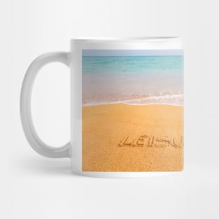 Inscription "LEISURE" made on beautiful beach by the blue sea Mug